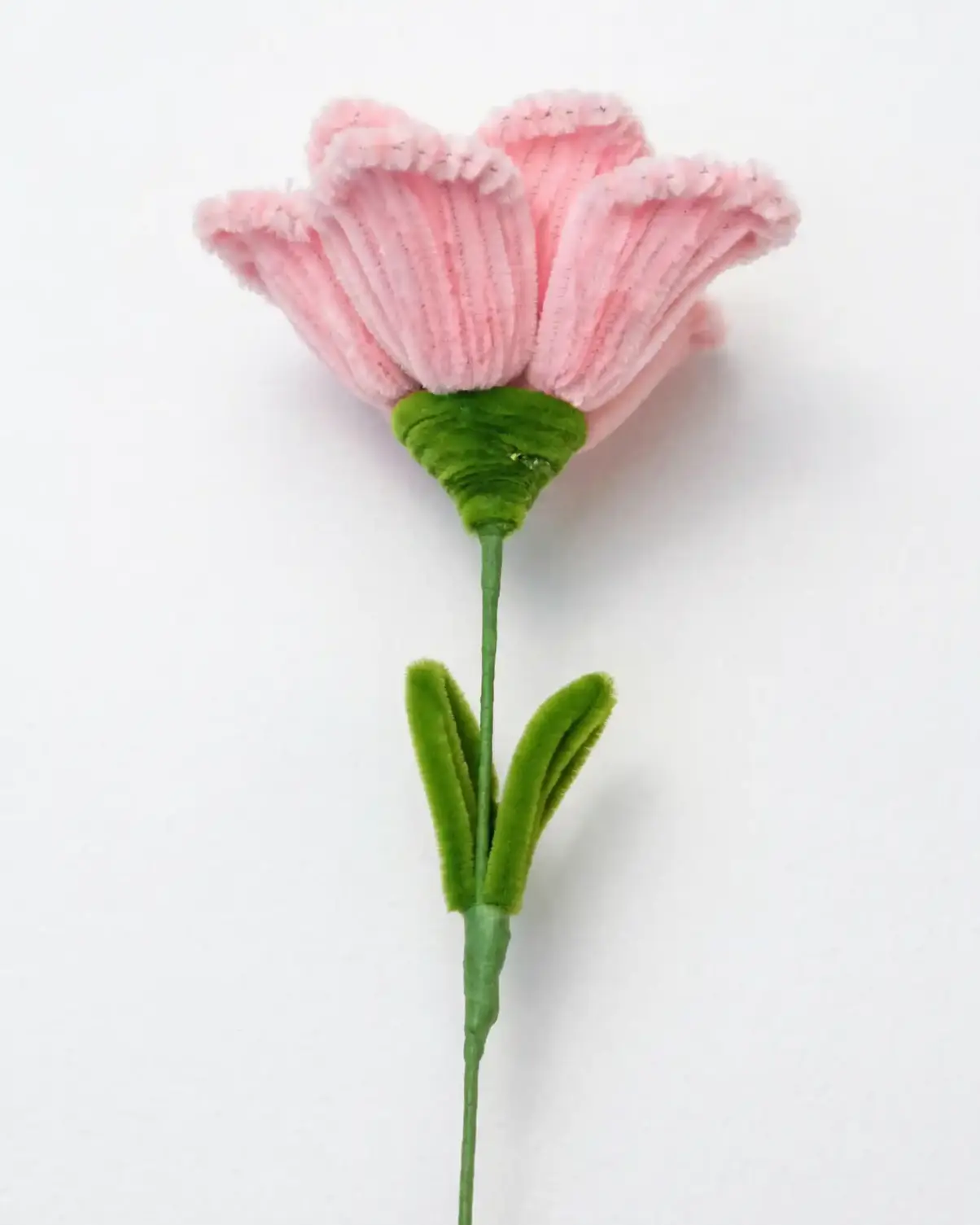 Full stem view of a finished artisan-made Glint Garden pink Lisianthus soft sculpture bloom