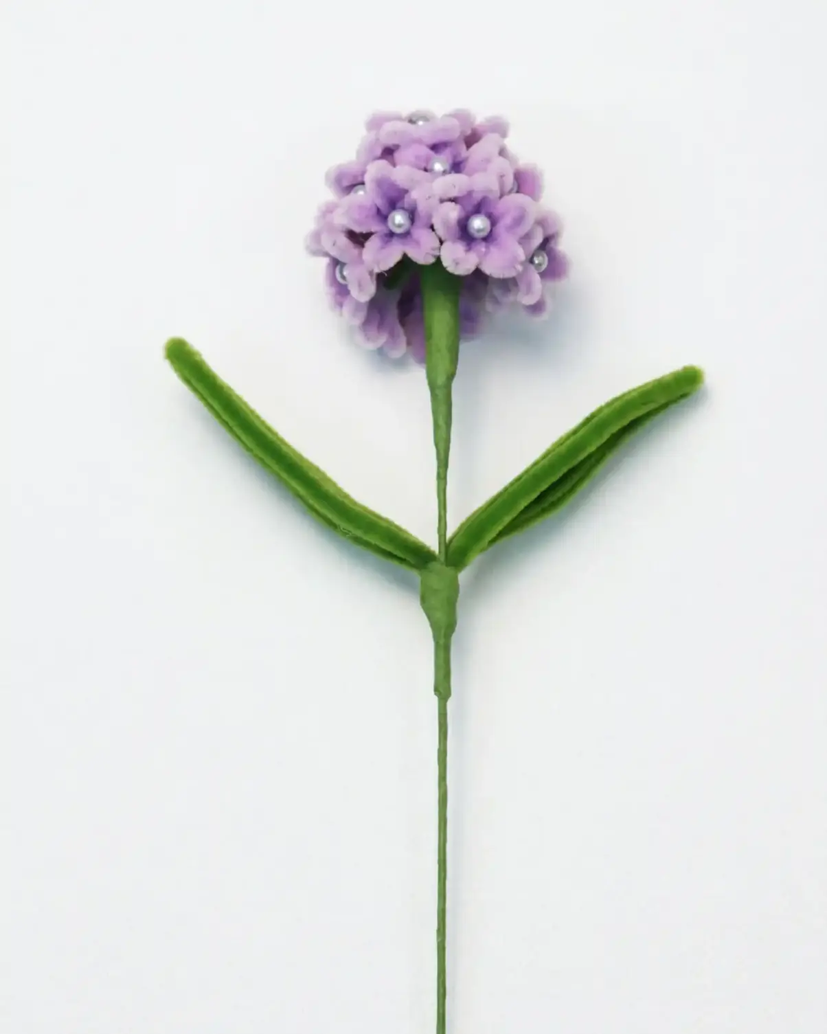 Full stem view of a finished artisan-made pink and purple gradient hydrangea soft sculpture by Glint Garden.