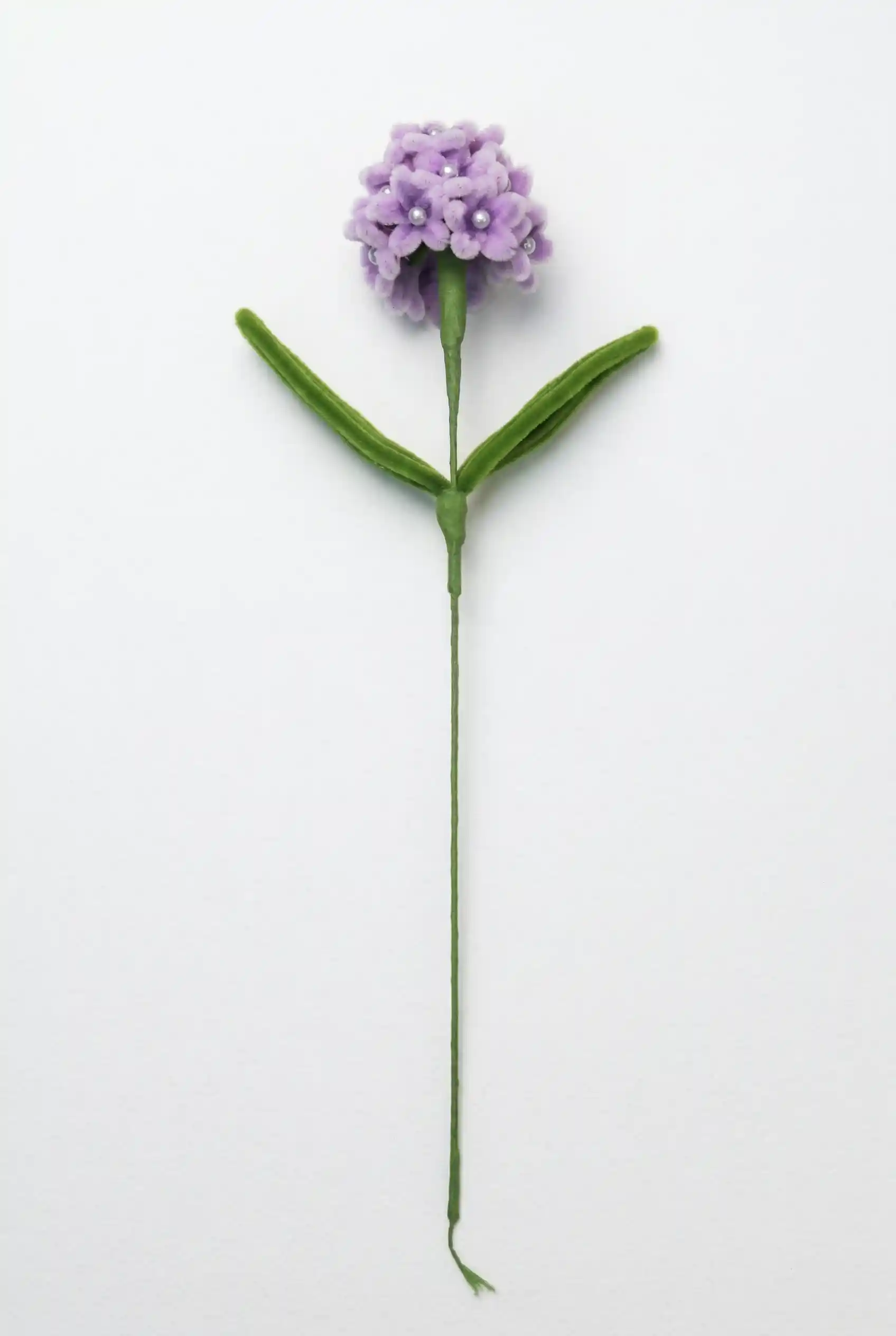 Full stem view of a finished artisan-made pink and purple gradient hydrangea soft sculpture by Glint Garden.