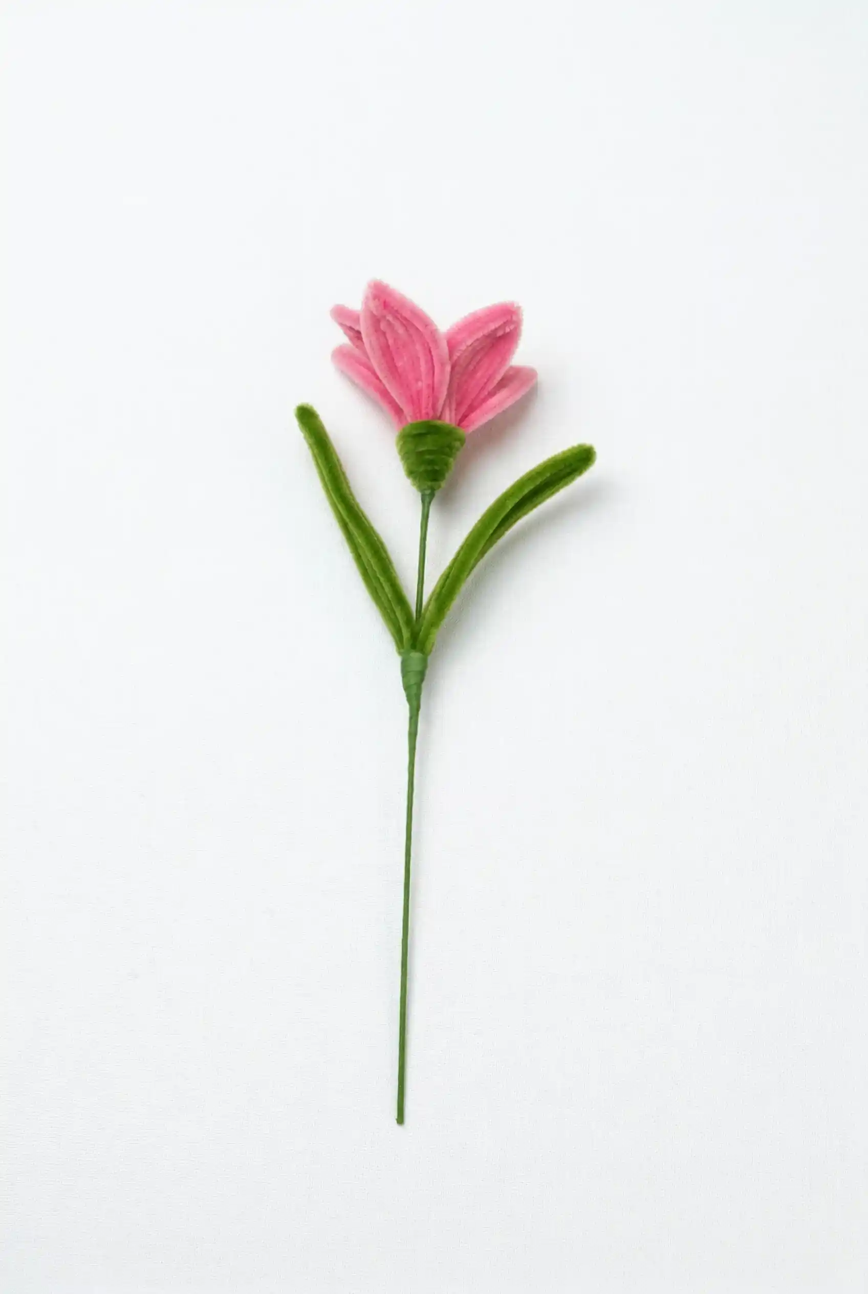 A finished pink Alstroemeria (Peruvian Lily) handmade soft sculpture by Glint Garden.