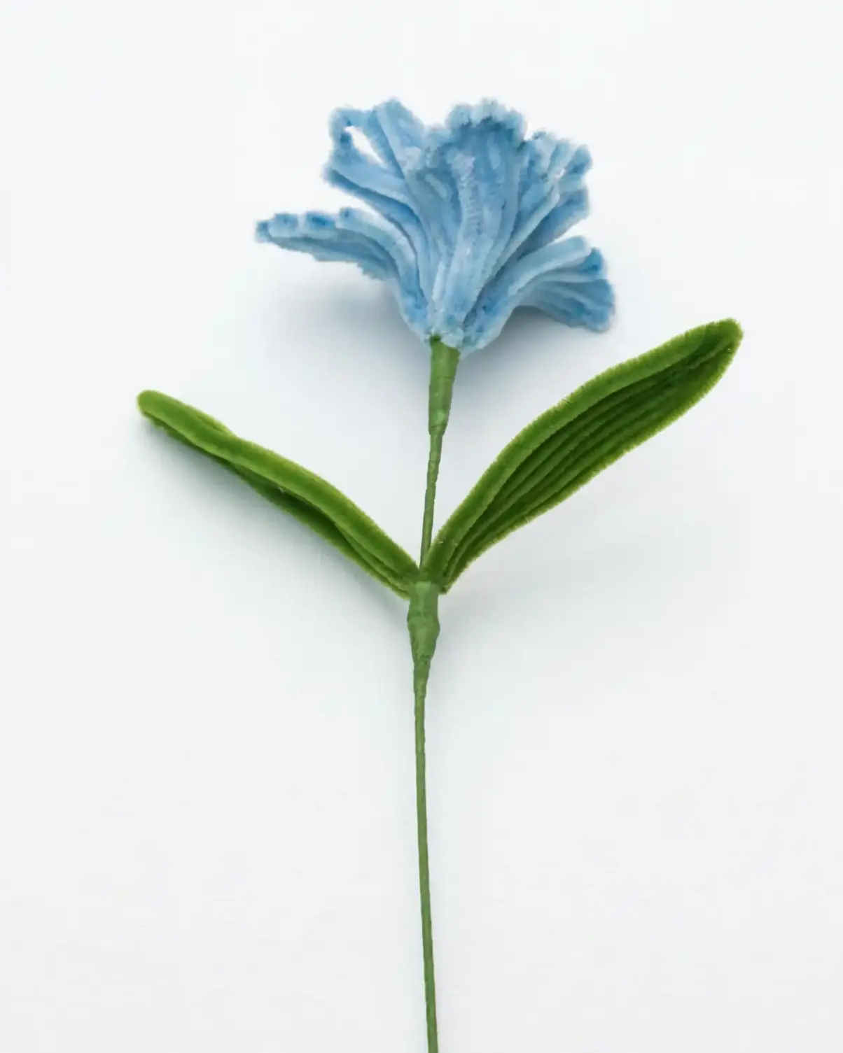 Full stem view of a finished artisan-made blue Iris, an architectural statement piece for minimalist home decor.