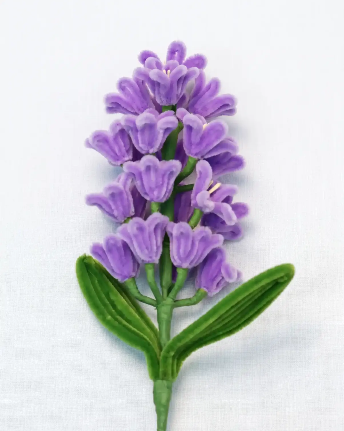 Close-up of a handcrafted chenille hyacinth flower cluster showing the intricate multi-bloom structure.